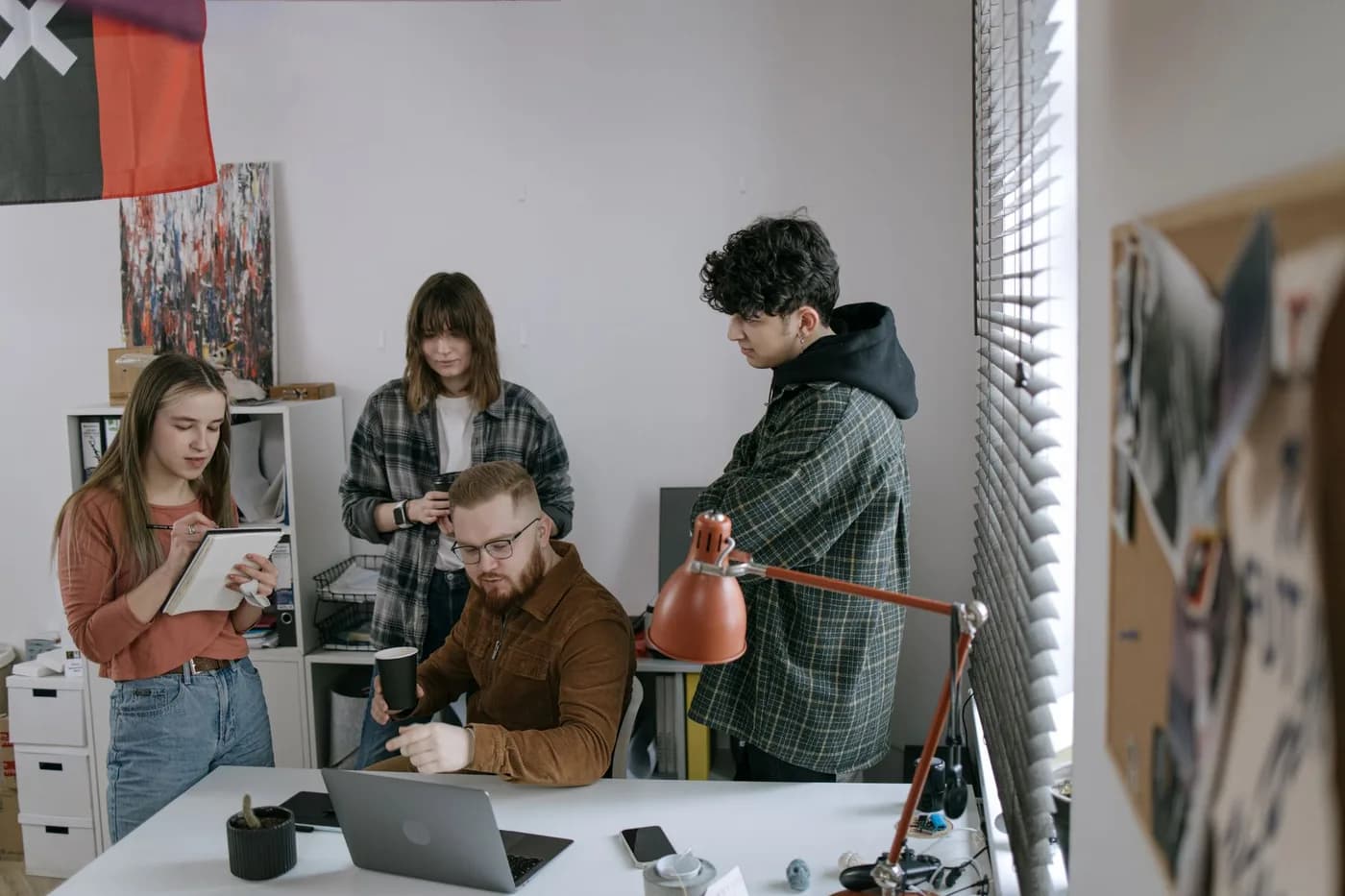 Young professionals in a team meeting at a startup office